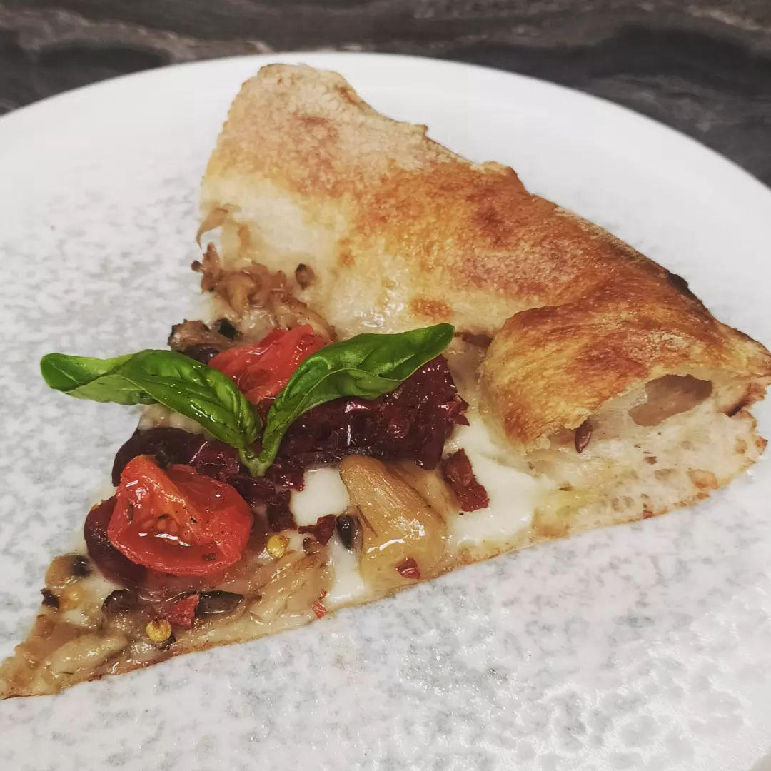 La pizza di #materia_milano porta bel cuore della città i sapori più autentici della Basilicata su u
